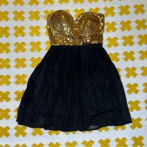Small black flowy and gold sequins top